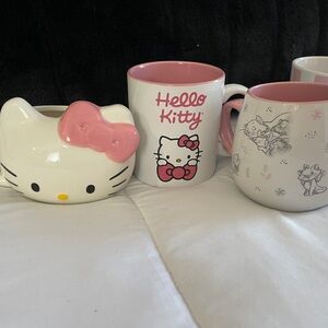 Hello Kitty and Marie Mugs